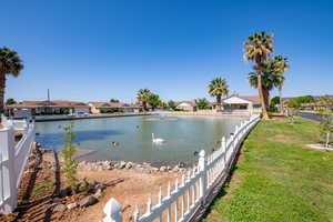 Water view featuring nearby suburban area