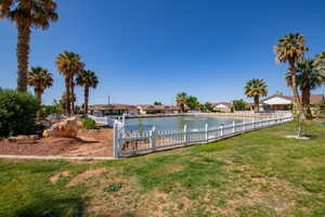 View of yard with a water view and a residential view