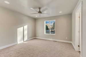 Unfurnished room with a ceiling fan, light carpet, recessed lighting, and baseboards