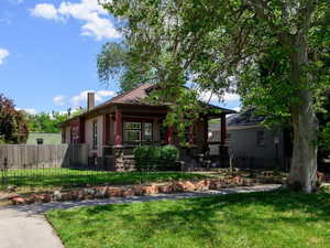 View of front of house with a chimney