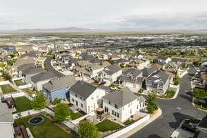 Aerial view of residential area with a mountainous background