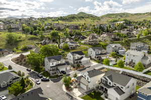 Aerial view of residential area with a mountainous background