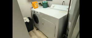 Basement-Laundry area with washer and dryer