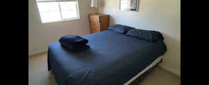 Main unit-Bedroom Carpeted bedroom featuring baseboards