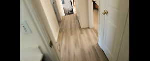 Basement unit-Corridor with light wood finished floors