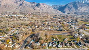 View of mountain background featuring nearby suburban area