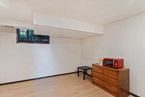 Basement bedroom featuring LVP floors
