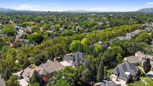 Aerial view of residential area with a mountainous background
