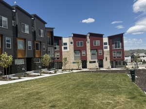 View of community with a yard and a residential view