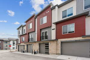 View of property with a garage