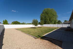 View of yard with a patio