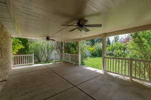 View of covered patio / terrace with a ceiling fan