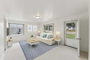 View of carpeted living area - Virtually Staged