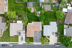 Aerial view of property's location with nearby suburban area