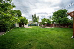 View of yard with an outdoor structure