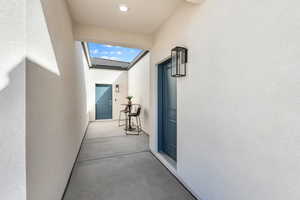 Hall featuring a skylight