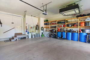 Garage featuring storage shelfs