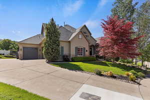 View of front of property featuring gorgeous landscaping