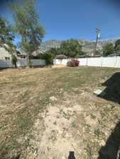 View of yard with a mountain view