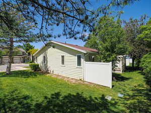 View of side of home with driveway