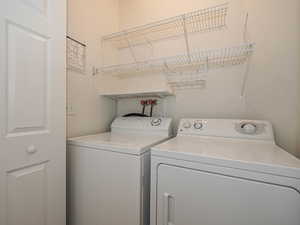 Laundry room with washing machine and dryer
