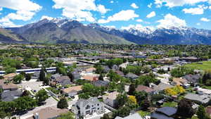 Aerial view of residential area featuring mountains