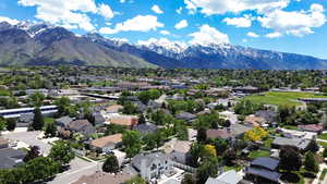 Aerial view of residential area featuring mountains