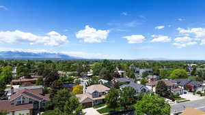Aerial perspective of suburban area with mountains