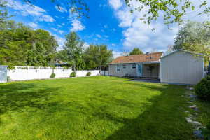 View of the completely landscaped backyard