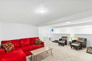 Living area featuring carpet floors