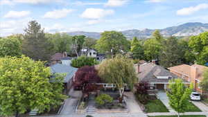 View of subject property with a mountain backdrop