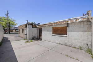 View of property exterior featuring a patio area