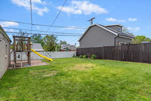 View of yard with a playground