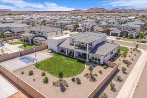 Aerial view of residential area featuring mountains