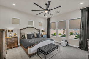 Bedroom with carpet floors, baseboards, recessed lighting, and a ceiling fan