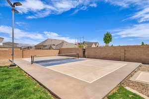 View of basketball court with basketball court and a tennis court