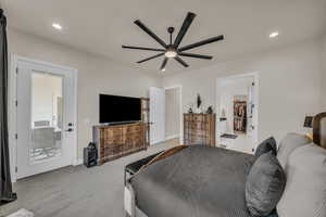 Bedroom with light carpet, ceiling fan, recessed lighting, and baseboards