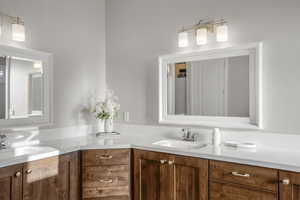 Bathroom featuring double vanity