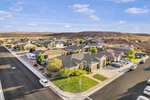 Aerial perspective of suburban area with a mountain backdrop
