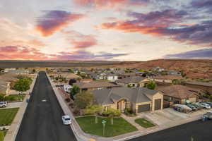 Aerial view at dusk of a residential view and a mountain view