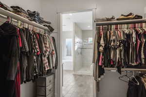 Spacious closet featuring wood finished floors