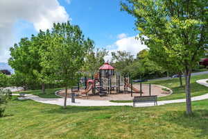 Communal playground featuring a yard