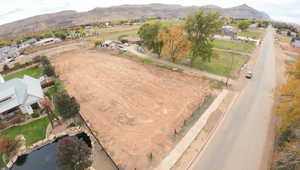 Aerial overview of property's location with a mountain backdrop