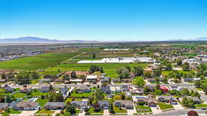 Aerial view of residential area with a mountainous background