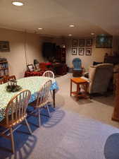 Dining room featuring carpet and recessed lighting