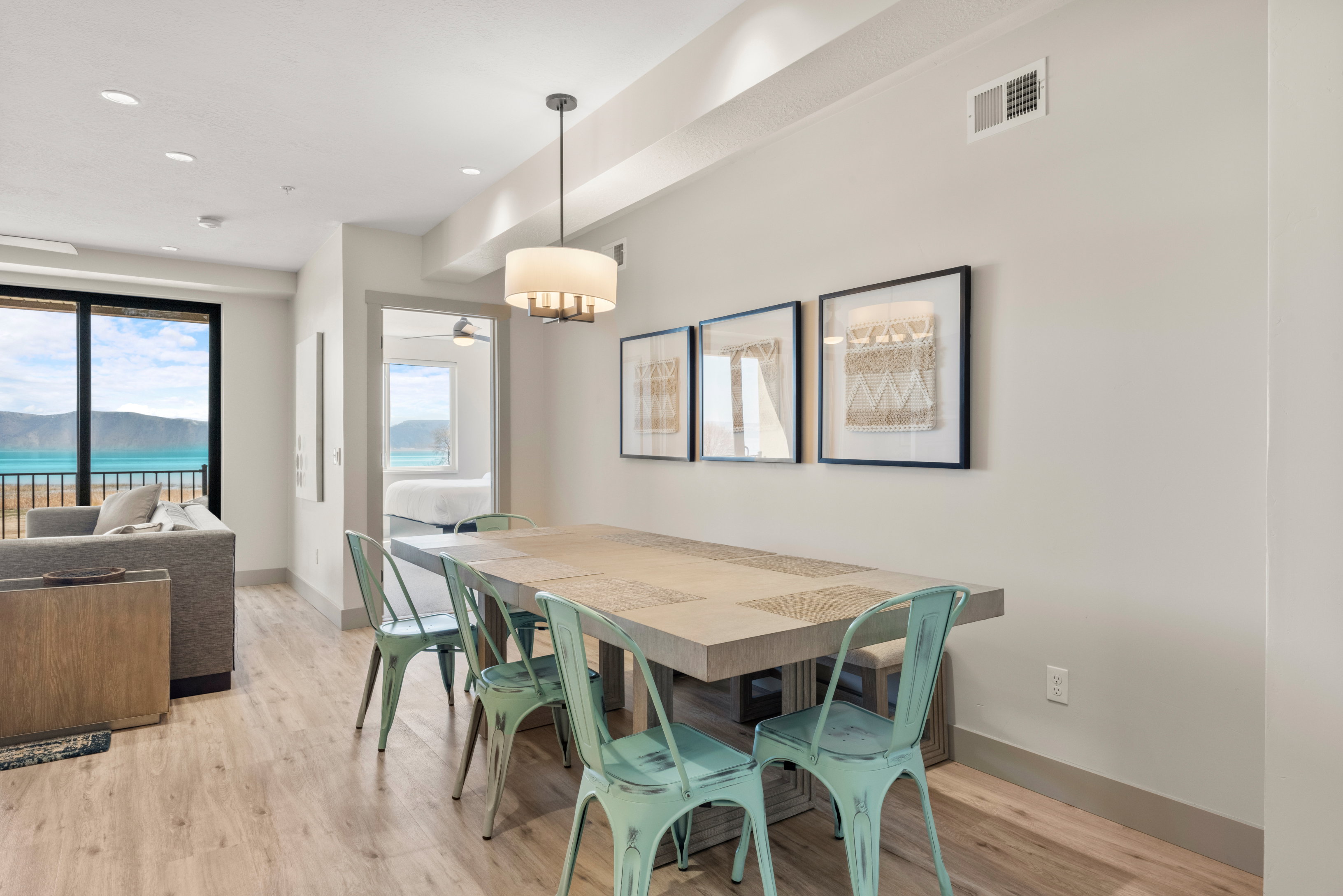 Dining space featuring light wood-type flooring, baseboards, and recessed lighting