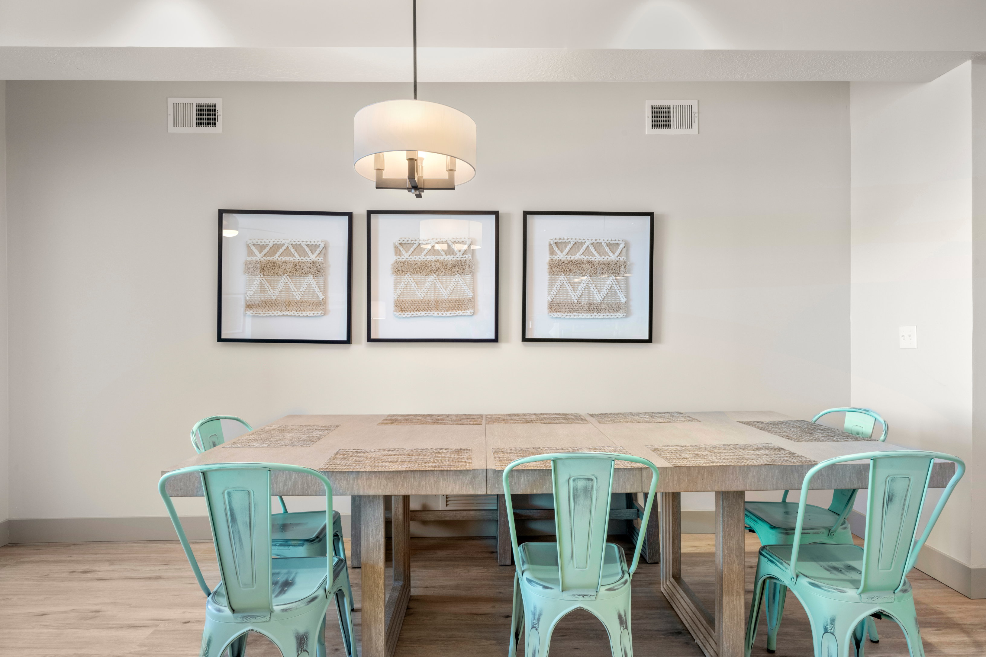 Dining space with baseboards and wood finished floors