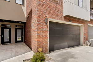 Garage featuring driveway