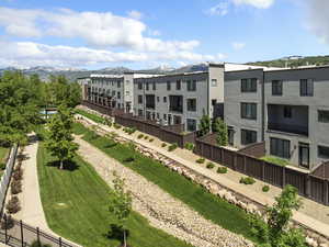 Surrounding community featuring a mountain view