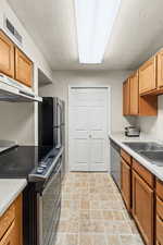 Galley kitchen for intimate meal prep and ease